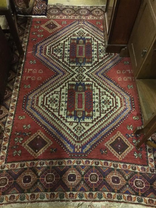 Caucasian design red ground rug(-)